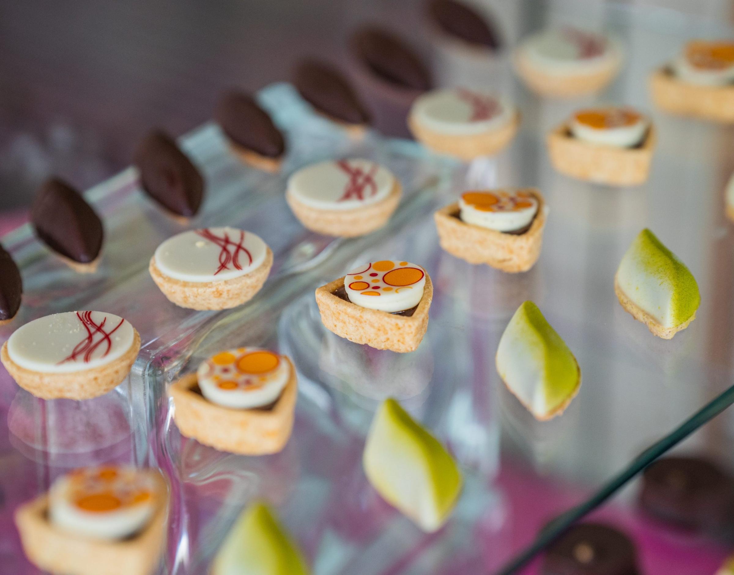 Tray of assorted miniature desserts for a corporate event catering